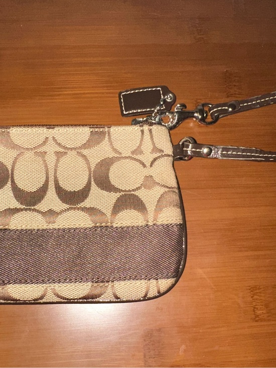 Coach Handbags - Coach Beige and Brown Signature Canvas Wristlet
